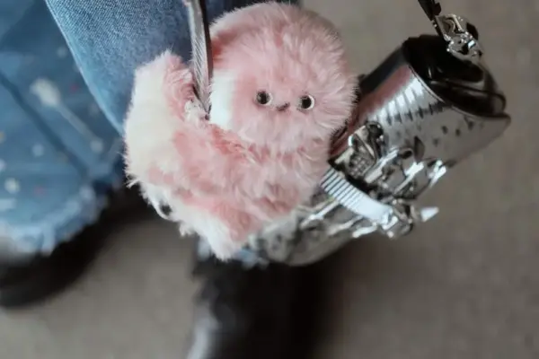 The Return of the Tamagotchi Generation: Can a Fluffy Bag Charm Heal Our Big Tech Fatigue?