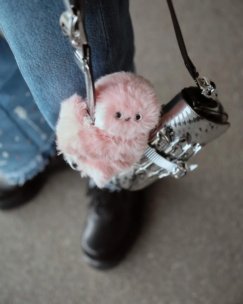 The Return of the Tamagotchi Generation: Can a Fluffy Bag Charm Heal Our Big Tech Fatigue?